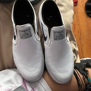 all white nike slip ons